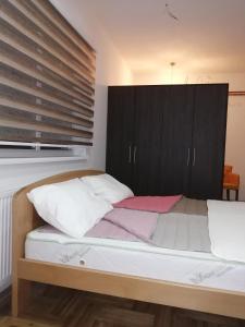 Postel nebo postele na pokoji v ubytování ORTODOKS