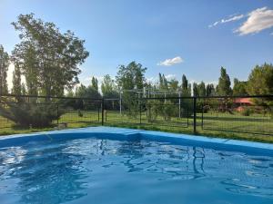 Swimming pool sa o malapit sa Cabañas Aramaití