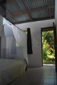 Postel nebo postele na pokoji v ubytování Los Mineros Guesthouse