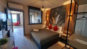 Postel nebo postele na pokoji v ubytování Letstay Panorama Suites