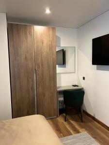 TV a/nebo společenská místnost v ubytování Loft wood