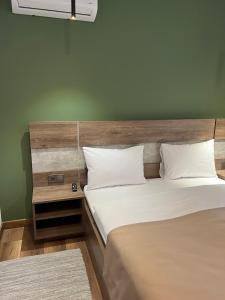 Postel nebo postele na pokoji v ubytování Loft wood