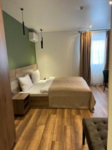 Postel nebo postele na pokoji v ubytování Loft wood