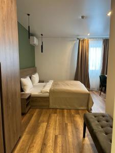 Postel nebo postele na pokoji v ubytování Loft wood
