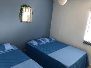 Ένα ή περισσότερα κρεβάτια σε δωμάτιο στο House Relax Parque das Águas Quentes +20 φωτογραφίες