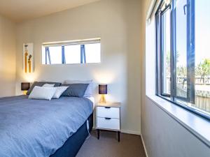 Posteľ alebo postele v izbe v ubytovaní Alpine Place - Spa and Mountain Views