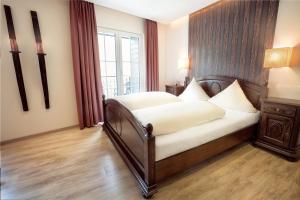 Postel nebo postele na pokoji v ubytování Hotel Filla Andre