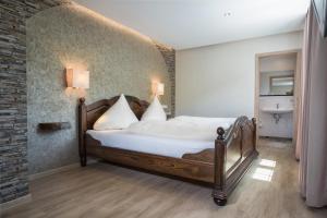 Postel nebo postele na pokoji v ubytování Hotel Filla Andre
