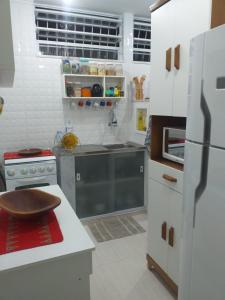 Kjøkken eller kjøkkenkrok på Apartamento Paraíso das Dunas em Cabo Frio