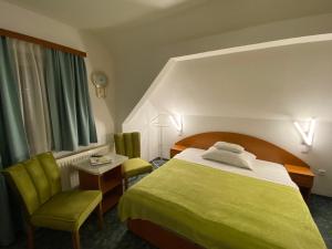En eller flere senge i et værelse på Villa Valeria