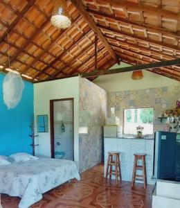 Kuchyň nebo kuchyňský kout v ubytování Chalé Anjo Gabriel I em São Tomé das letras.