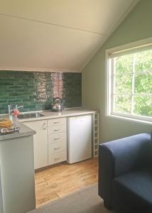 Кухня или мини-кухня в Hartley Homestead Boutique Bed & Breakfast

