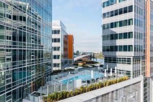 an aerial view of two tall buildings with a pool at Versante Hotel in Richmond