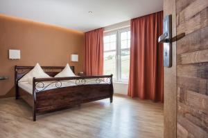 Postel nebo postele na pokoji v ubytování Hotel Filla Andre
