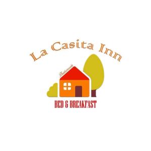 a logo for a real estate firm with a house at La Casita Inn Bustamante in Bustamante