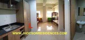 Kuchyň nebo kuchyňský kout v ubytování Jhocson Residences