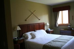 Postel nebo postele na pokoji v ubytování Hotel Floyd