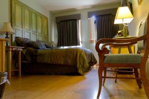 Postel nebo postele na pokoji v ubytování Hotel Floyd