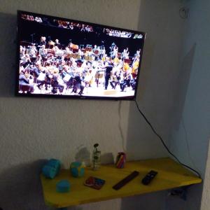 a flat screen tv hanging on a wall at @casa__grace in Cartagena de Indias