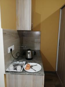Kuchyň nebo kuchyňský kout v ubytování SM Rooms HSR Layout Bengaluru