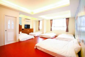 Ein Bett oder Betten in einem Zimmer der Unterkunft Mermaid B&B