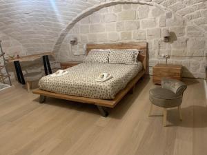 Postel nebo postele na pokoji v ubytování Le Vecchie Mura suite & room