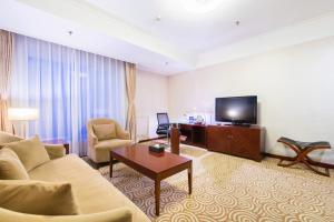 TV a/nebo společenská místnost v ubytování Inner Mongolia Grand Hotel