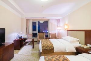 TV a/nebo společenská místnost v ubytování Inner Mongolia Grand Hotel