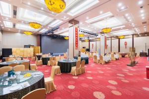 TV a/nebo společenská místnost v ubytování Inner Mongolia Grand Hotel