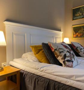 Postel nebo postele na pokoji v ubytování Bergsgården Hotell & Konferens