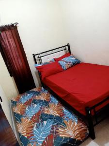 Ένα ή περισσότερα κρεβάτια σε δωμάτιο στο Sella Guest House