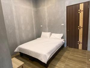 Postel nebo postele na pokoji v ubytování 琉漾民宿