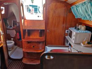 A kitchen or kitchenette at Sleep on a Sailing Boat Barcelona