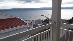 a view of the water from a balcony at Apartments IVAN in Duce (900) in Duće
