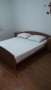Postel nebo postele na pokoji v ubytování Apartments IVAN in Duce (900)