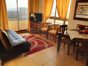 TV a/nebo společenská místnost v ubytování Departamento Atlántico Viña Del Mar