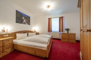 Voodi või voodid majutusasutuse Hotel Similaun toas