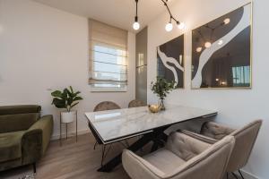 Posezení v ubytování Green Sky Luxury Penthouse Apartment