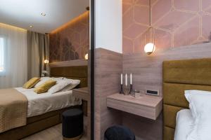 Postel nebo postele na pokoji v ubytování Green Sky Luxury Penthouse Apartment