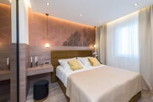 Postel nebo postele na pokoji v ubytování Green Sky Luxury Penthouse Apartment