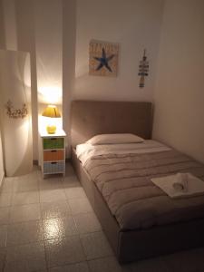 Letto o letti in una camera di Guest House Oleandro
