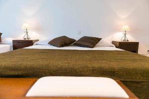 Posteľ alebo postele v izbe v ubytovaní Villa de vacaciones con encanto El Serrat