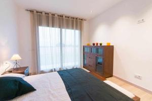 Posteľ alebo postele v izbe v ubytovaní Villa de vacaciones con encanto El Serrat