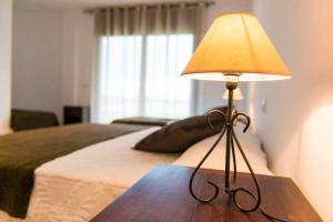 Posteľ alebo postele v izbe v ubytovaní Villa de vacaciones con encanto El Serrat