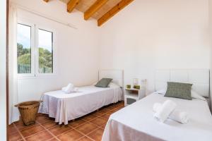 Postel nebo postele na pokoji v ubytování Villa Ses 5 Claus + 17 fotografií
