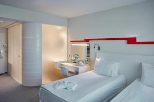 Cama ou camas em um quarto em Holiday Inn Vilnius by IHG