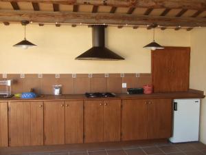 Kuchyňa alebo kuchynka v ubytovaní Casa rural, masia antigua restaurada