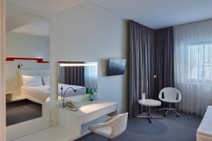 Cama ou camas em um quarto em Holiday Inn Vilnius by IHG