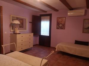 Posteľ alebo postele v izbe v ubytovaní Casa rural, masia antigua restaurada