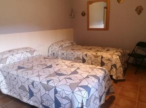 Posteľ alebo postele v izbe v ubytovaní Casa rural, masia antigua restaurada